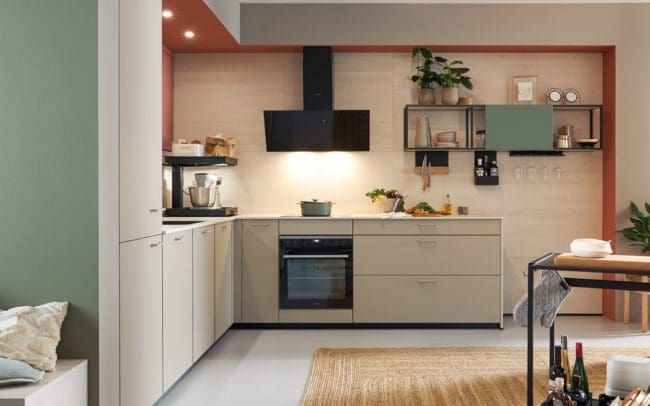 Contemporary Matera kitchen scene showing the spacious dining area with sleek, matt-finished cabinets in vibrant colors, complemented by stylish, sustainable interior fittings.
