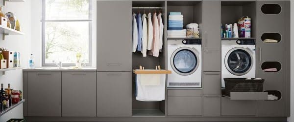 explore_utility_rooms_by_schuller image of a stylish, practical utility room by schuller in stone grey colour, designed by German Kitchens Cardiff
